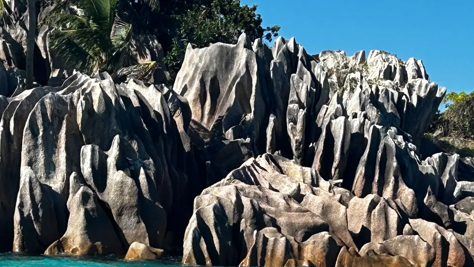 Eroded granite formations sculpted by wind and sea